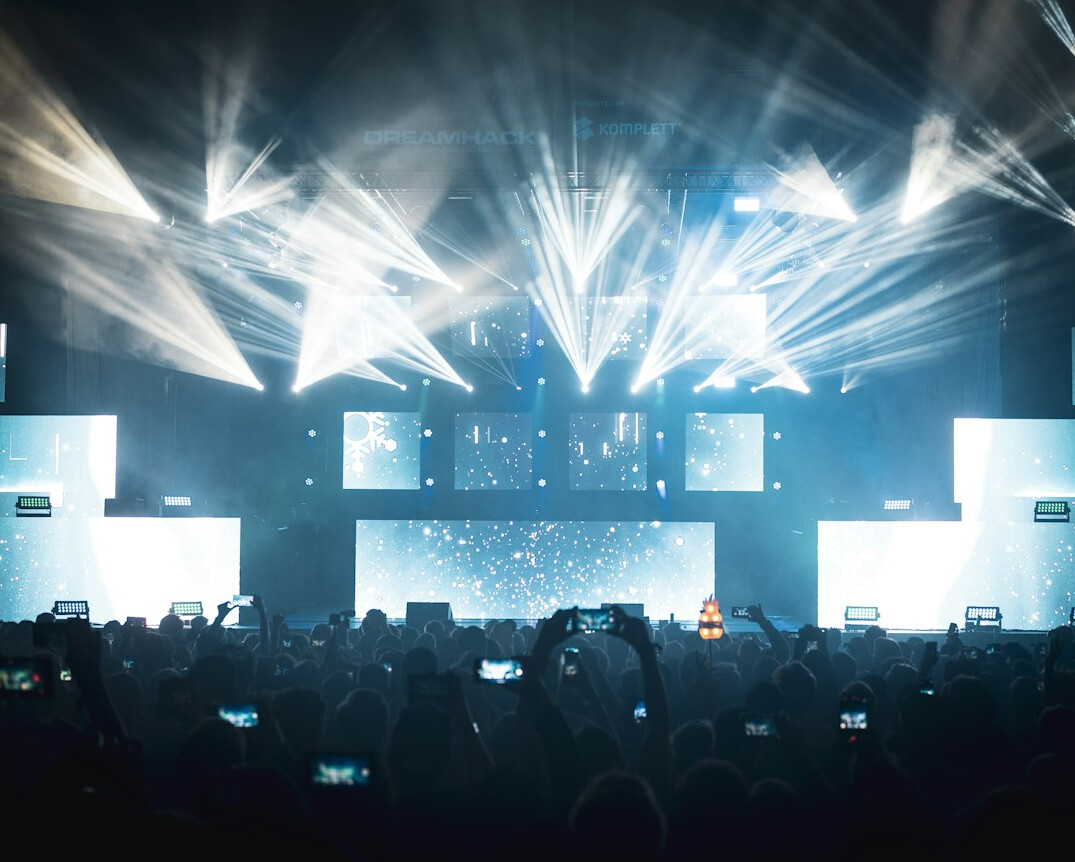 Live event with stage lights and crowd